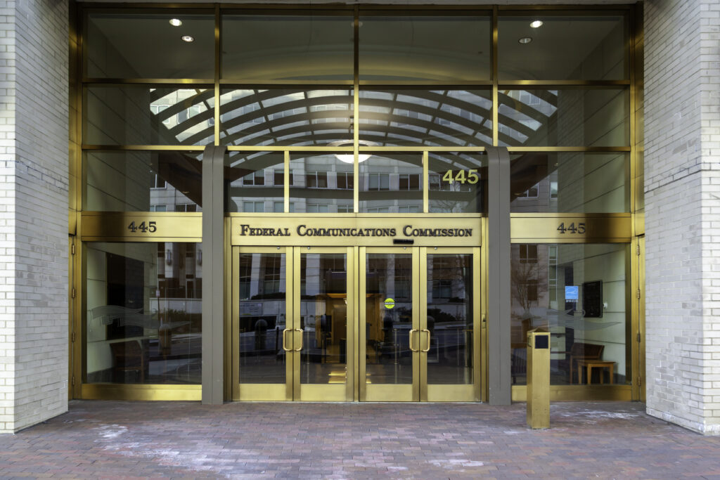  Entrance to Federal Communications Commission in Washington, D.C., USA. FCC is an independent agency of the USA government that regulates communications.